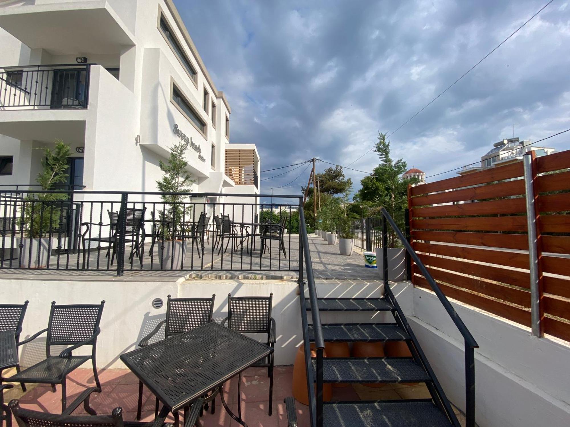 Opalium Beach Front Suites Потос Экстерьер фото
