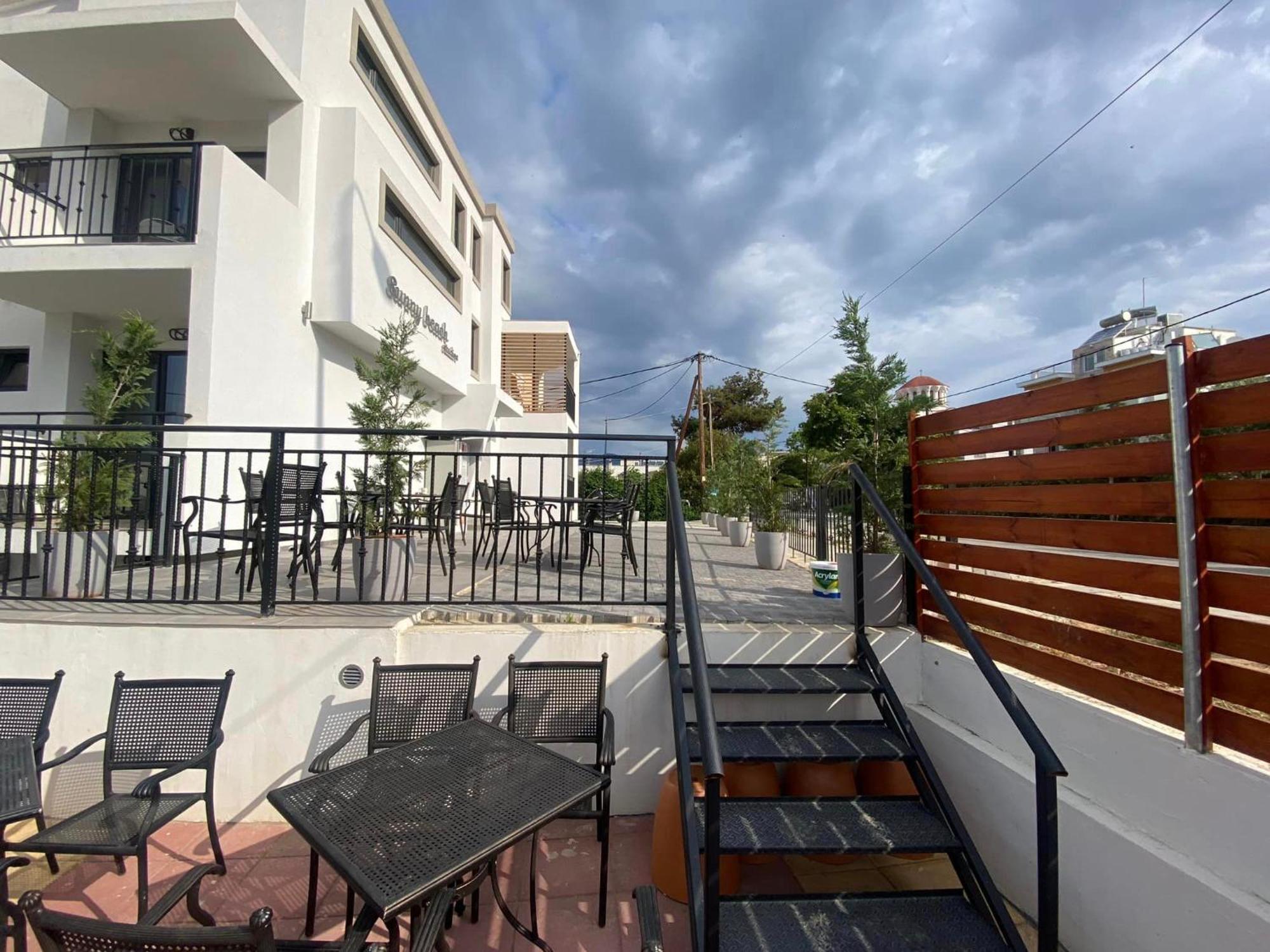 Opalium Beach Front Suites Потос Экстерьер фото